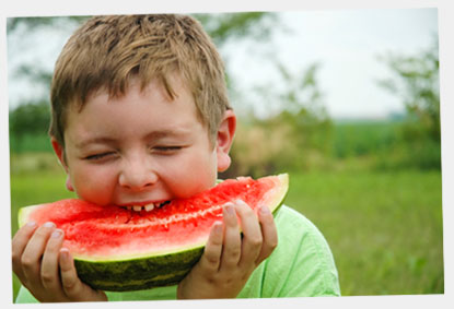 Child eating watermelon