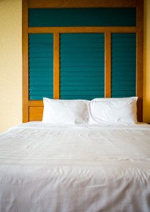 Clean bed in the morning processed in warm tone