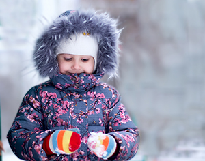 A girl smiling winter outdoors