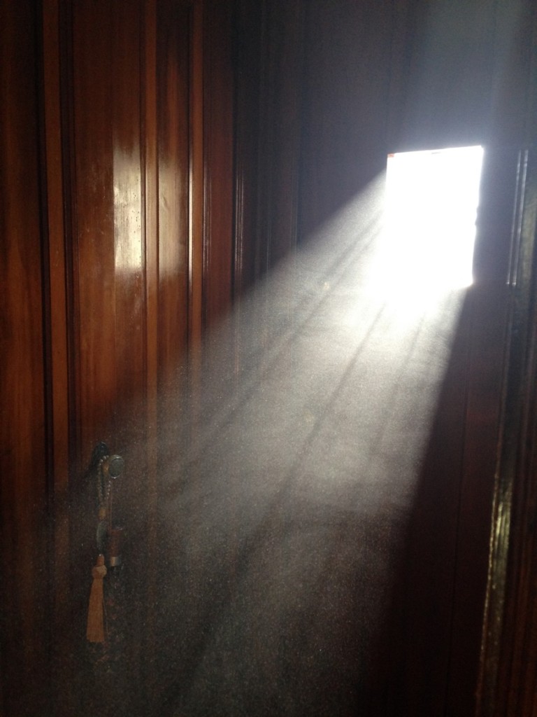 Ray of sun light in dusty house